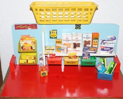 Vintage wooden toy grocery shop with accessories