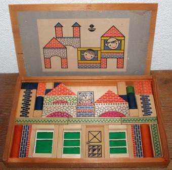 Oud vintage speelgoed bouwdoosje houten blokjes Vero huisjes