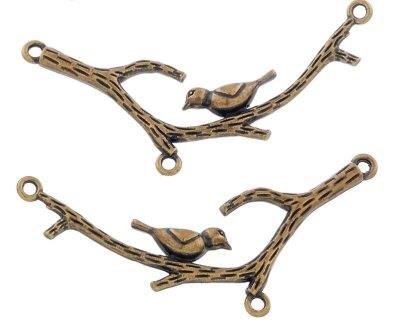 Old bronze, copper-colored insert, charm, branch with a bird