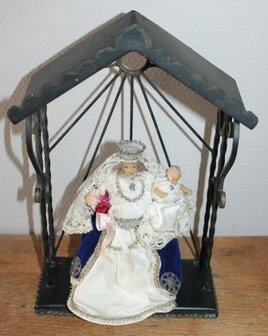 Old vintage brocante statue of Mary with child in metal niche