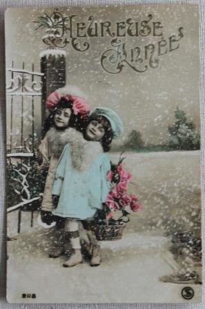 Antique vintage brocante Christmas postcard girls with flowers, colored
